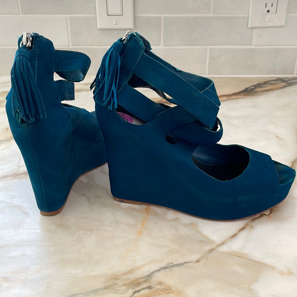 Pretty blue open toe wedge.